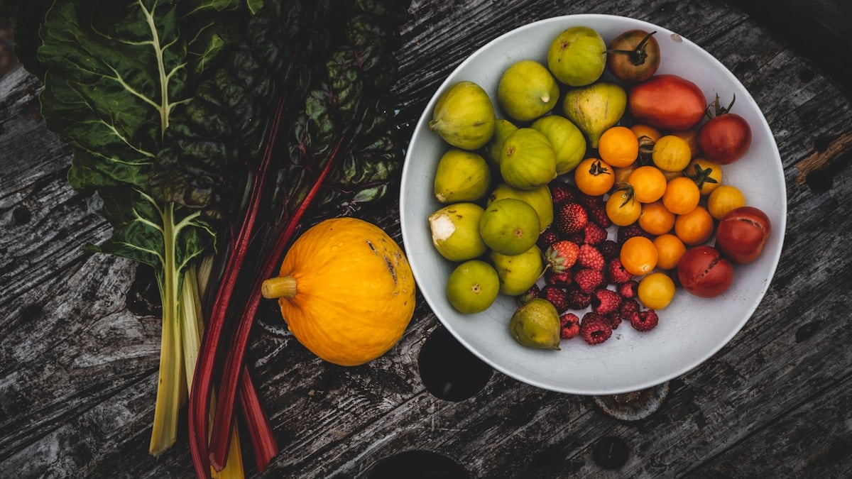 fruits on white ceramic bowl